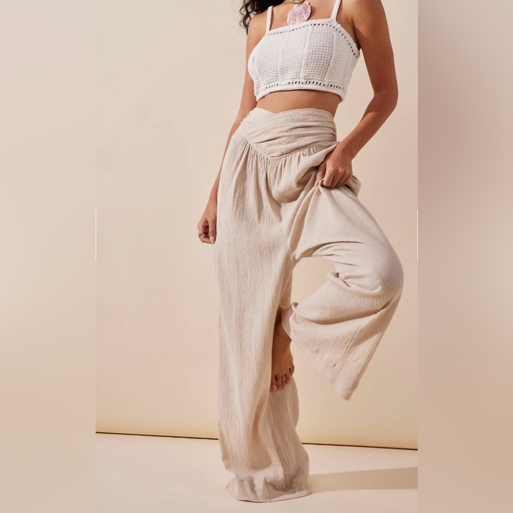 Free people “pack me up pants”. SUPER comfy only worn a couple times.